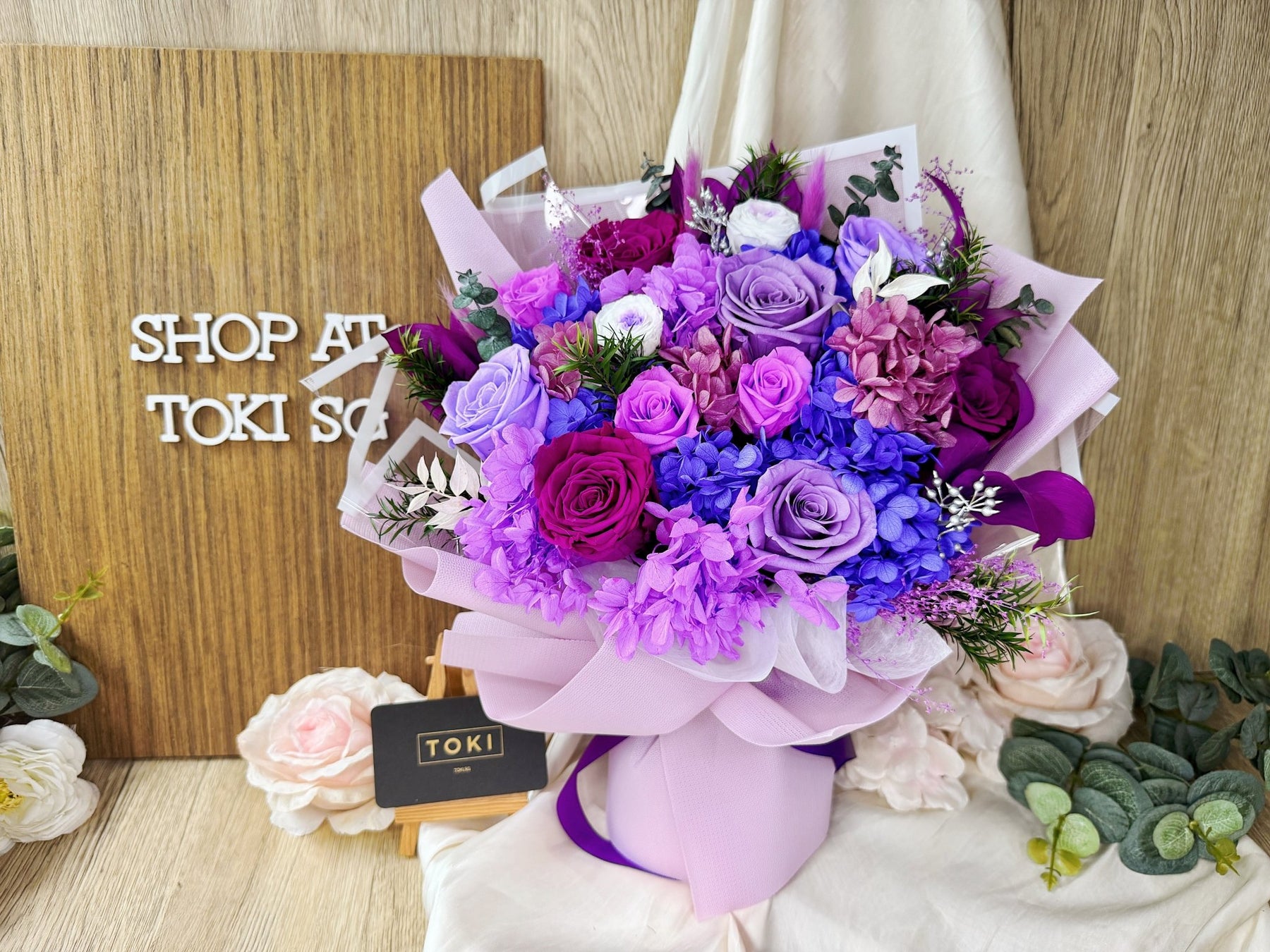 Dozen Violet Roses (